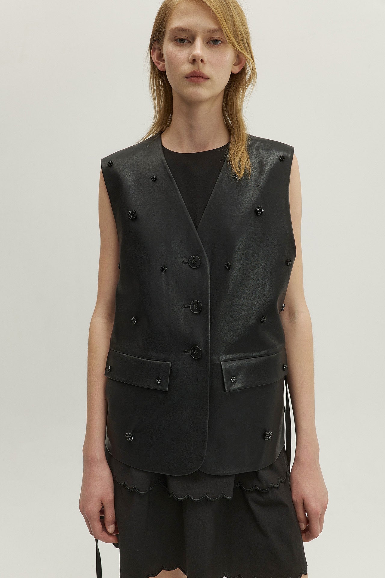 BEADED LEATHER VEST WITH BEADED EMBELLISHMENTS