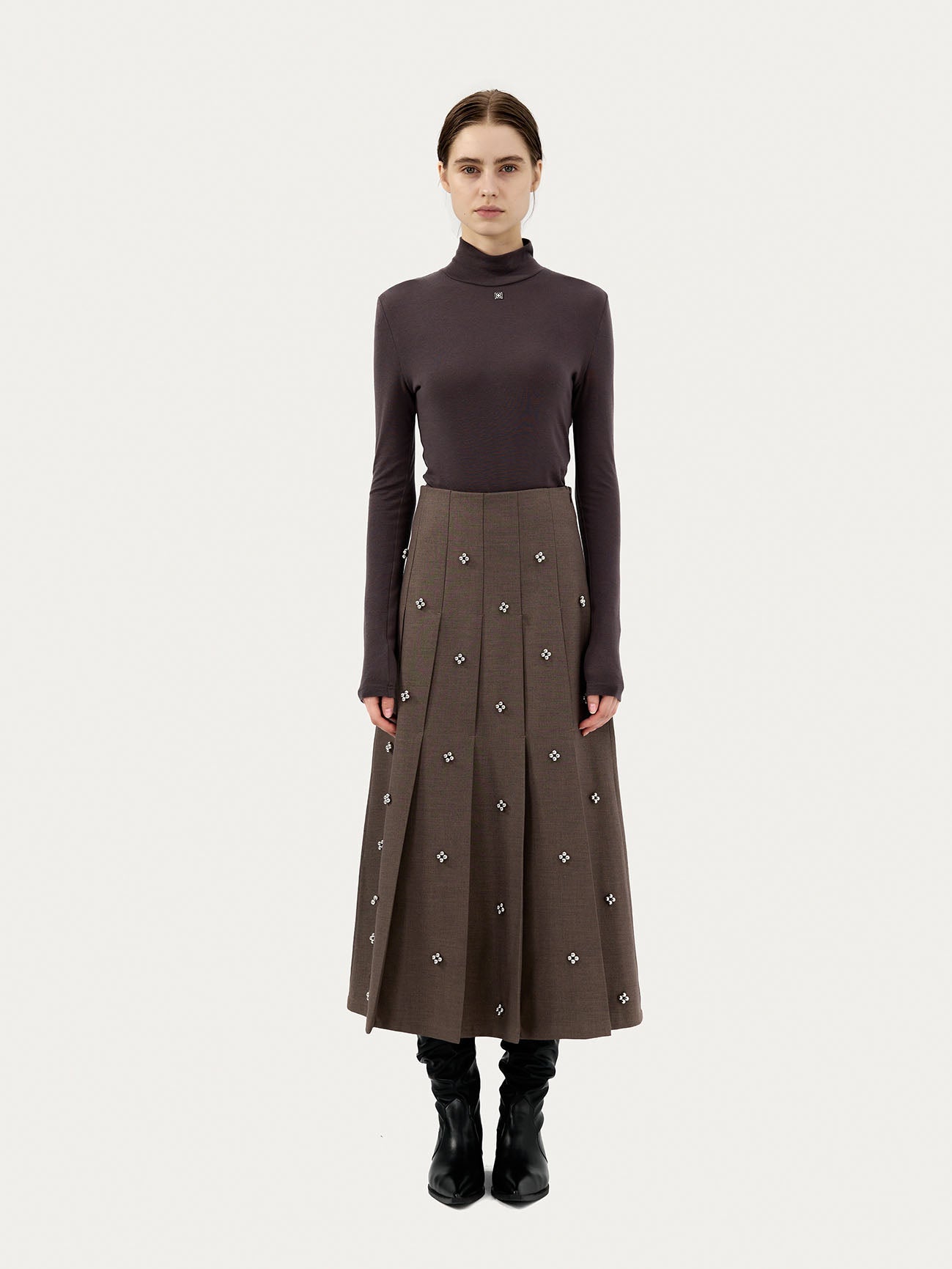 PLEATED SKIRT WITH BEADED EMBELLISHMENTS