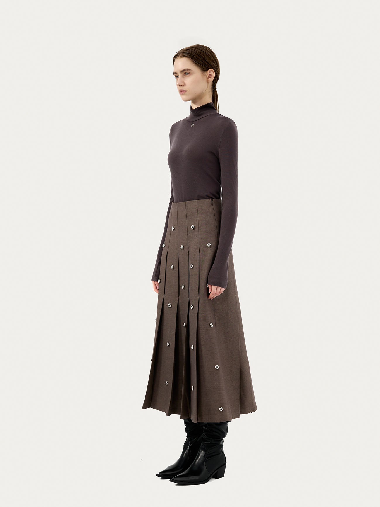 PLEATED SKIRT WITH BEADED EMBELLISHMENTS
