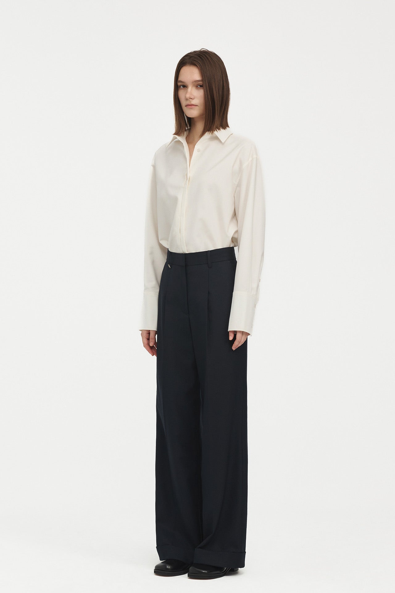 PLEATED TROUSERS